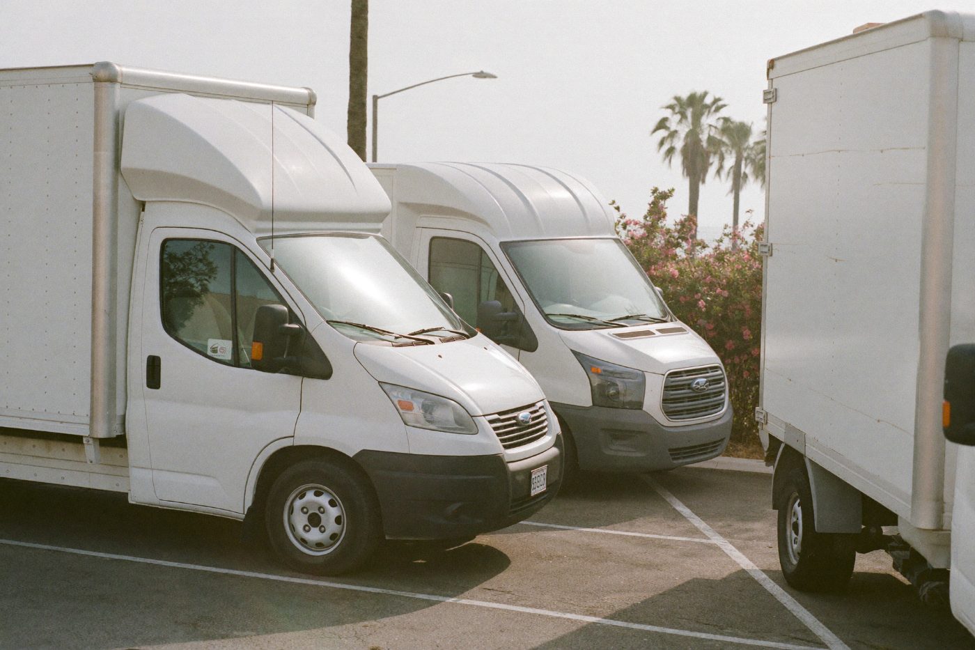 Cargo van on a highway at night with light trails